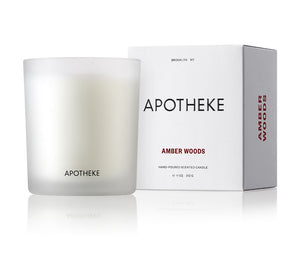 Apotheke 11oz single wick Amber Woods candle in jar with box packaging on the right. 