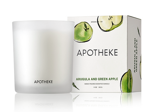 Apotheke Arugula and Green Apple 11oz candles with white background. Hand-poured scented candle. Jar with box packaging next to it.